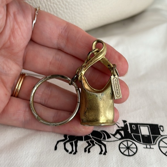 Coach Handbags - VINTAGE COACH 9085 DUFFLE SAC CHARM IN REPLATED CONDITION NOT NEW NOT EXCELLENT